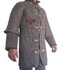 May include: A grey chainmail hauberk featuring a dark brown leather trim along the edges and four horizontal leather straps with brass-toned metal buckles down the front. The text "ARMOR" is printed in red on the chest of the metal link garment.